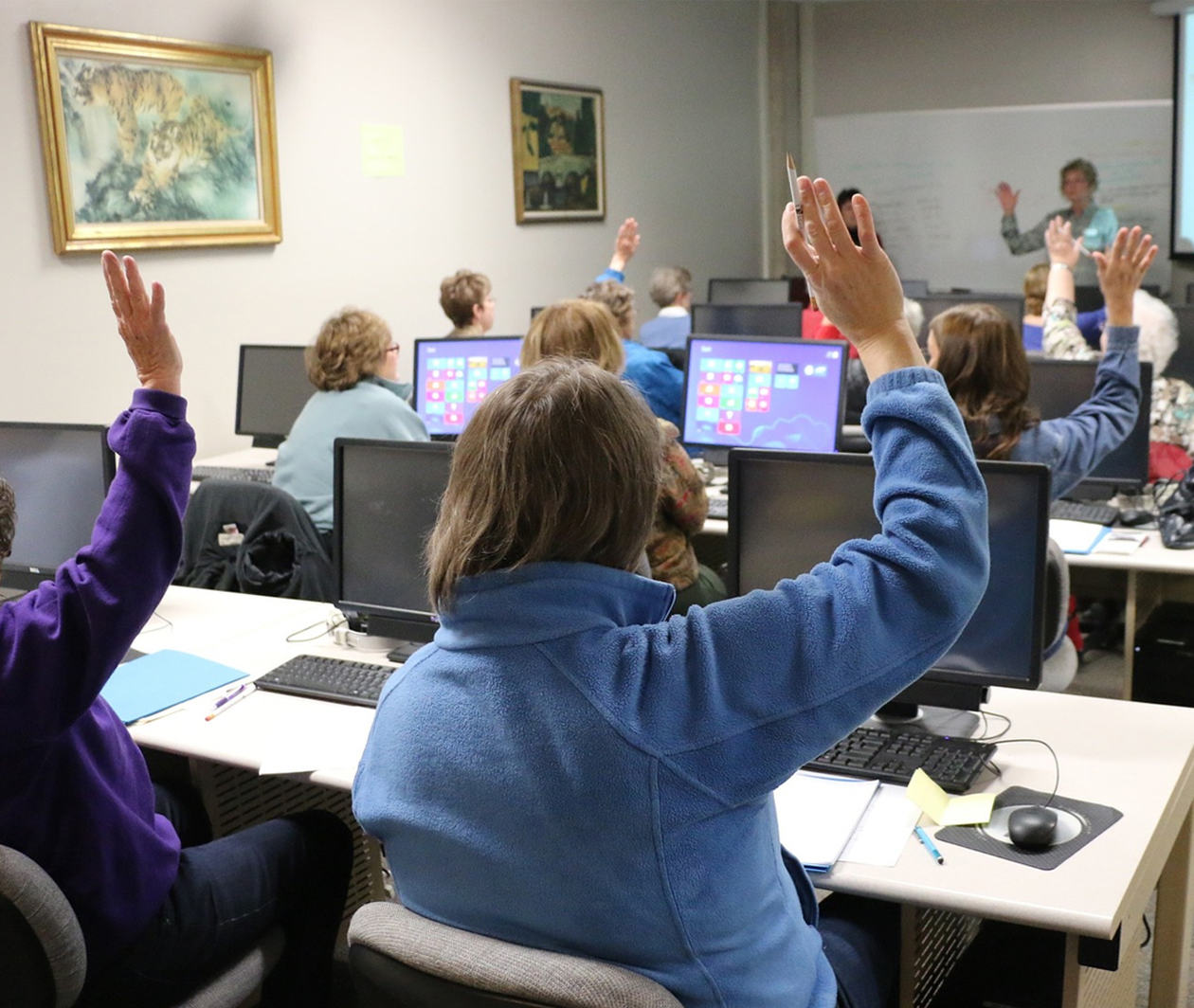 Classroom with mature students who all used computers