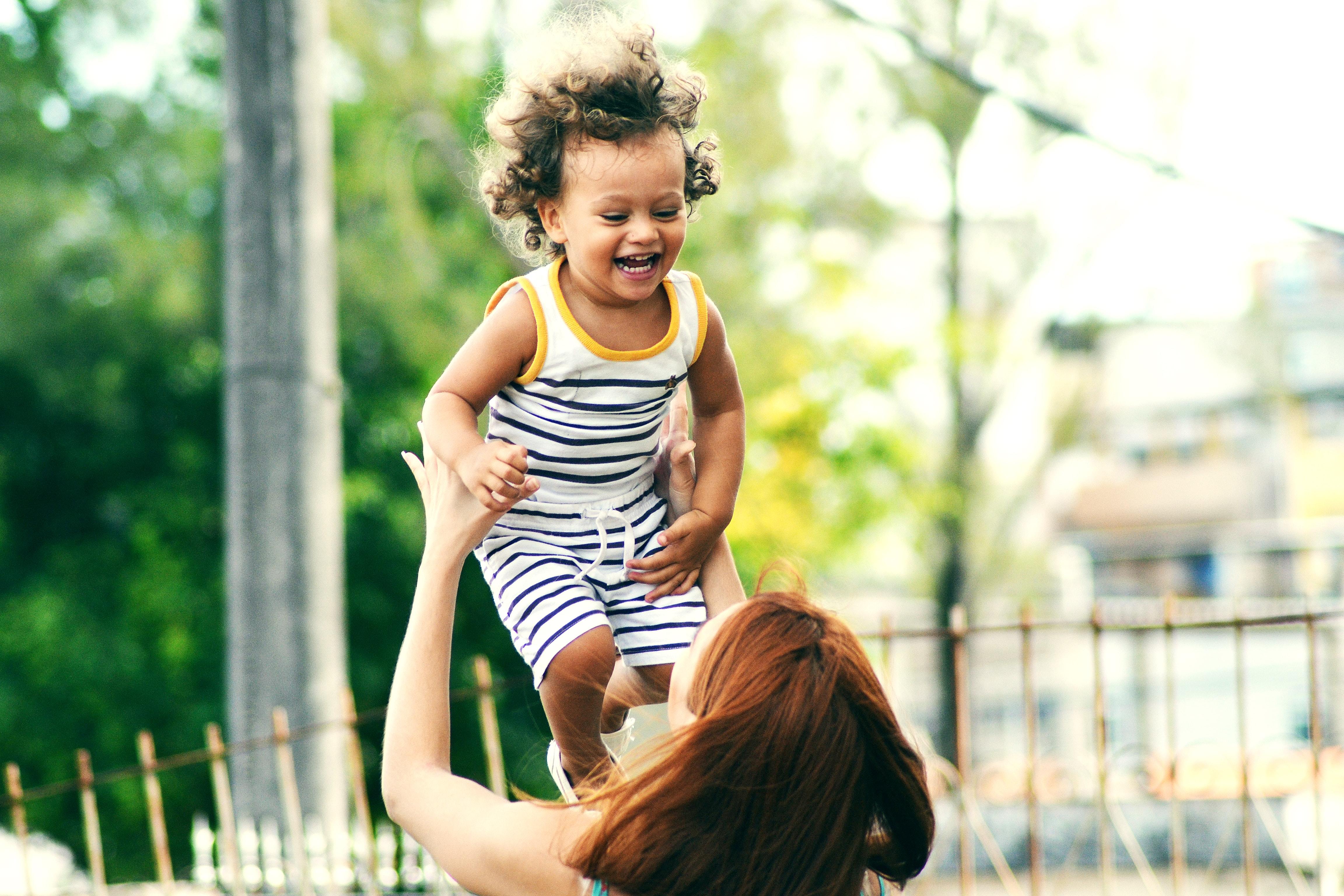 A mother playing games with her daughter