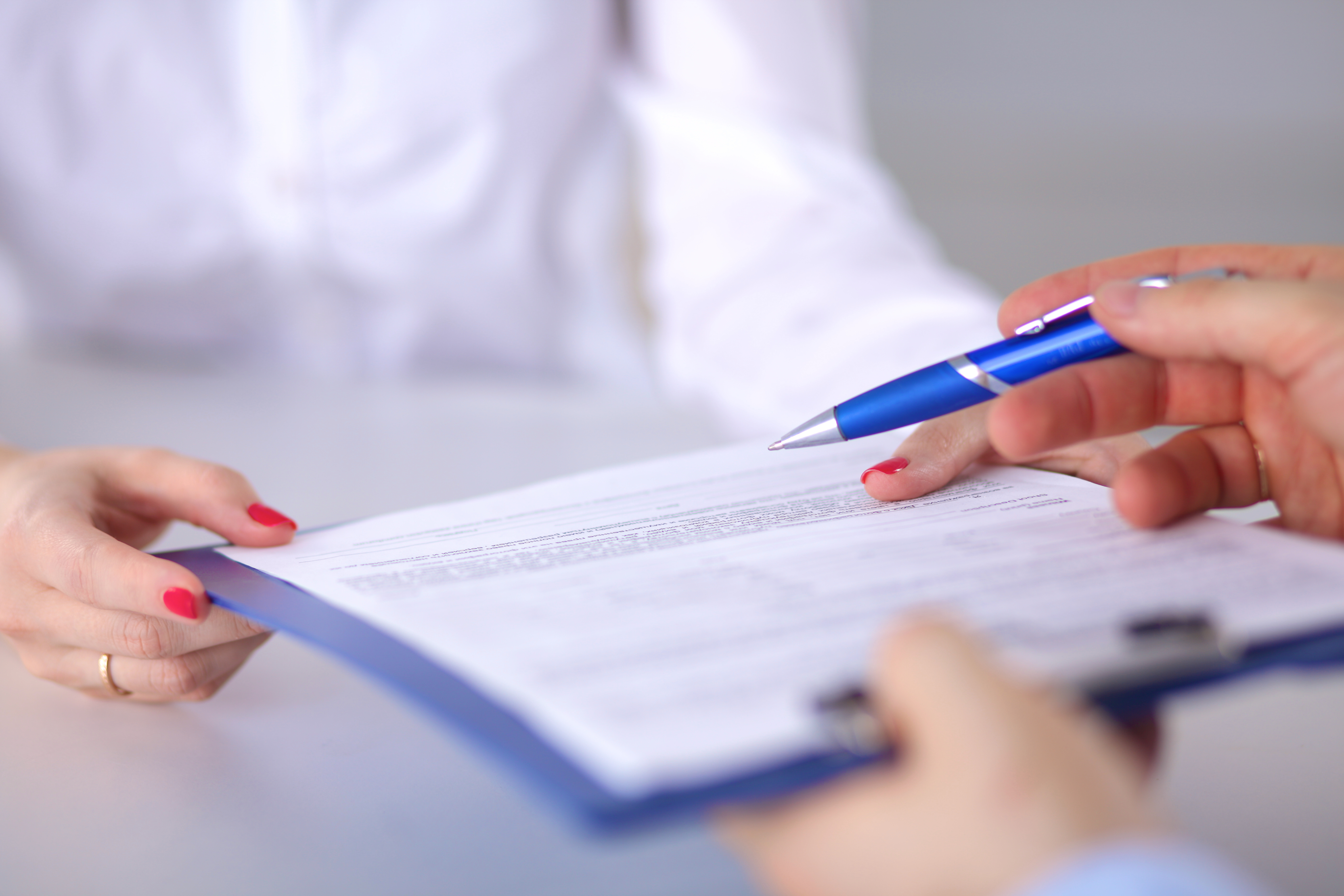 Woman with medical folder in her hand