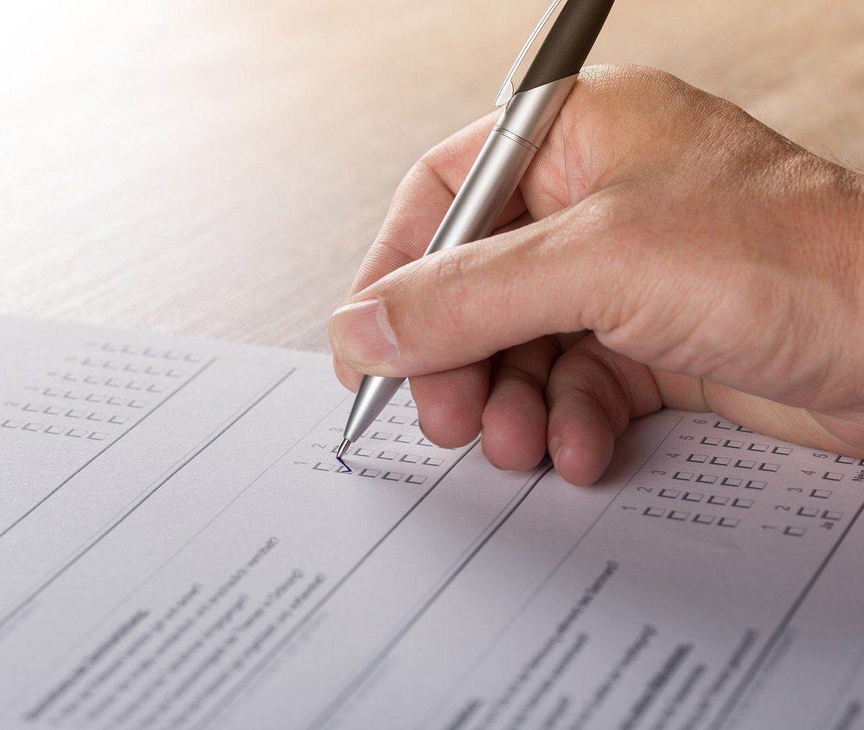 Photo of someone completing a survey