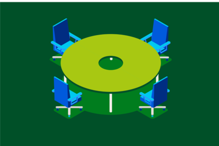 A circular boardroom table with four empty seats acting as spokes on a gear