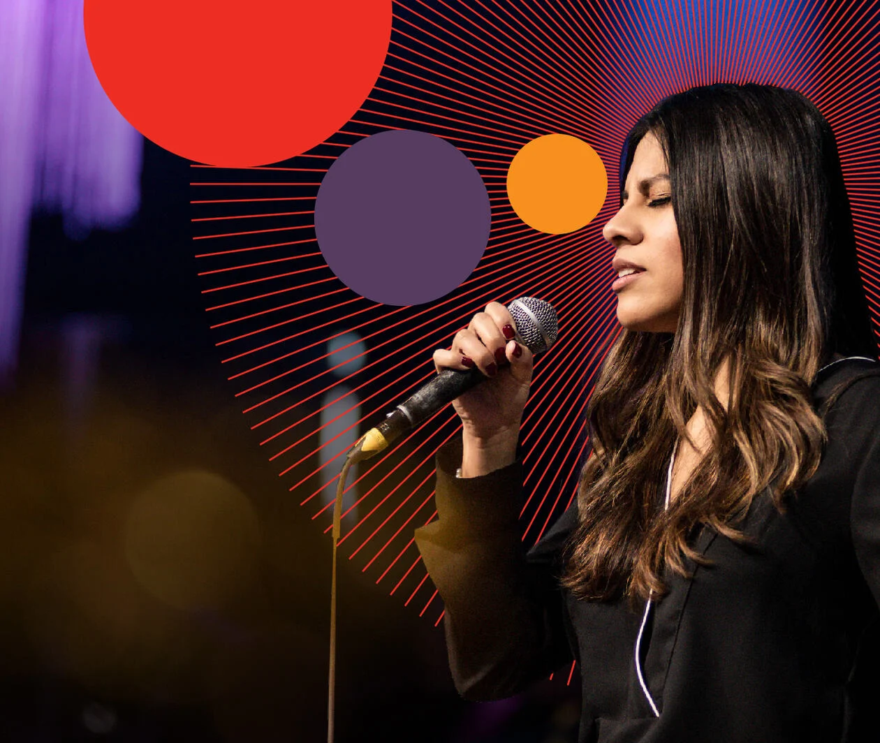 Female artist singing with a microphone 