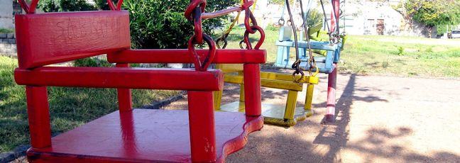 Colourful swings in a children's playground