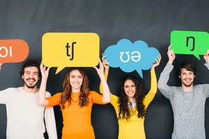 Four people holding speech bubbles