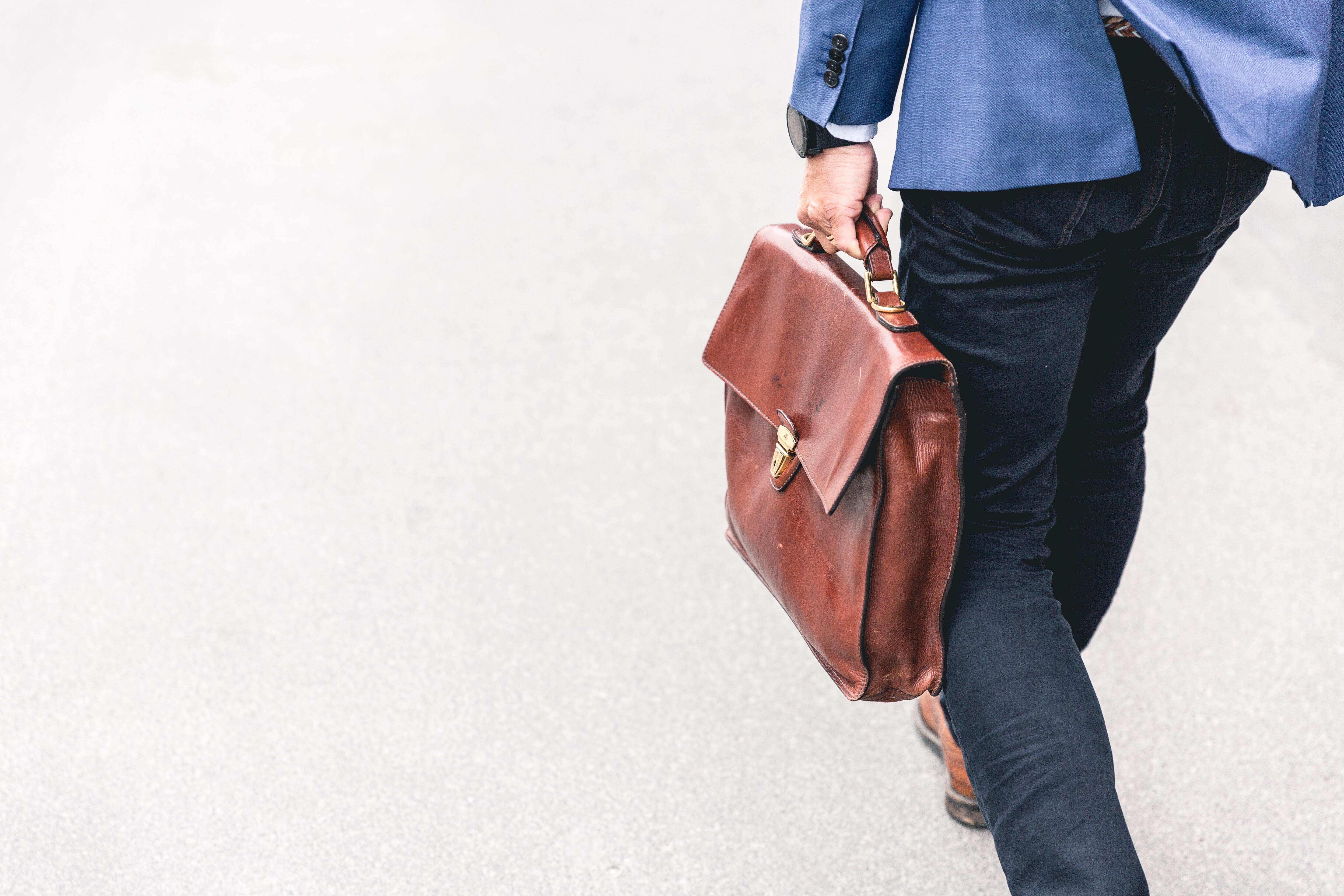 Men with a briefcase walking