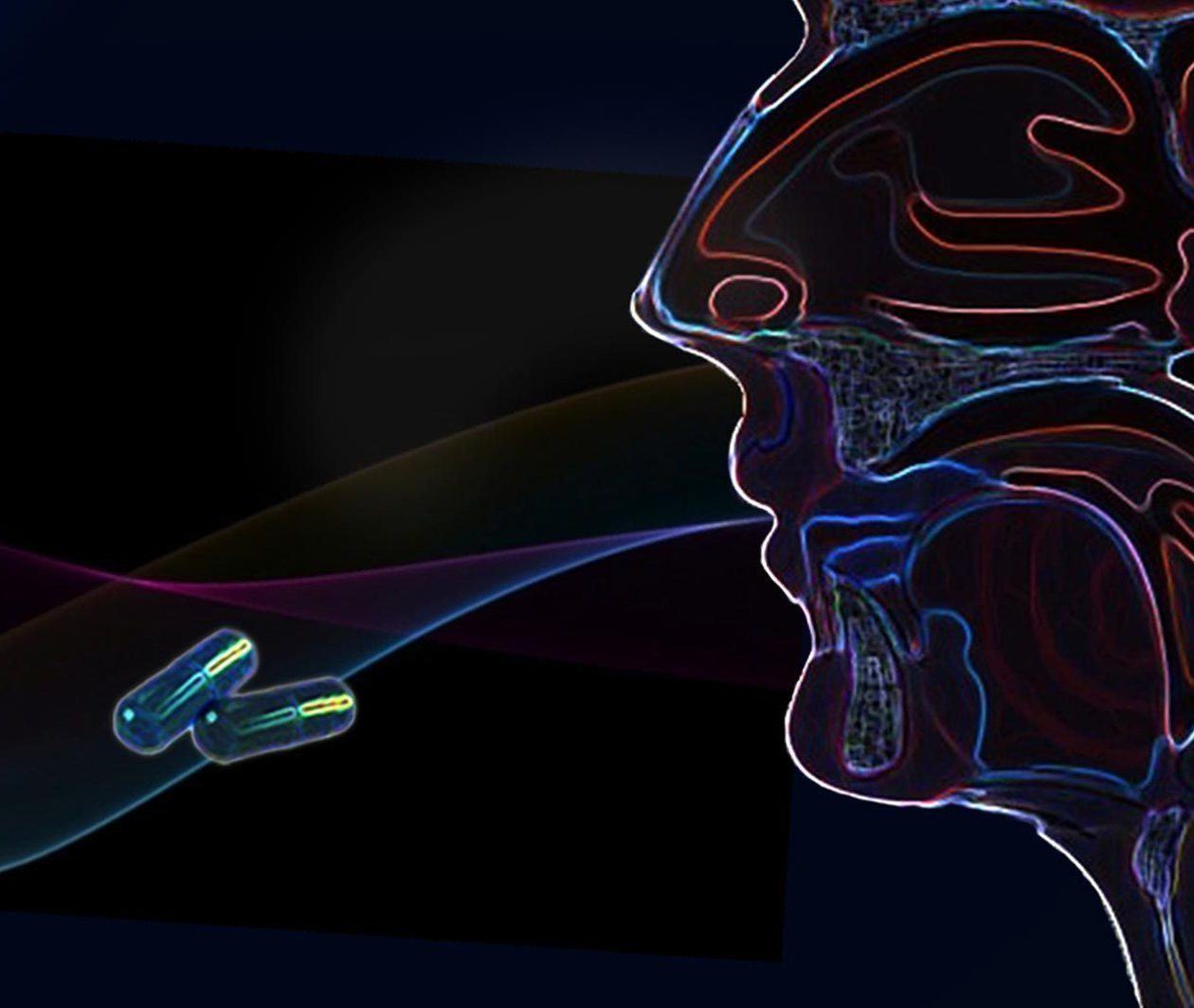 A graphic of a face and two pills to symbolise dysphagia