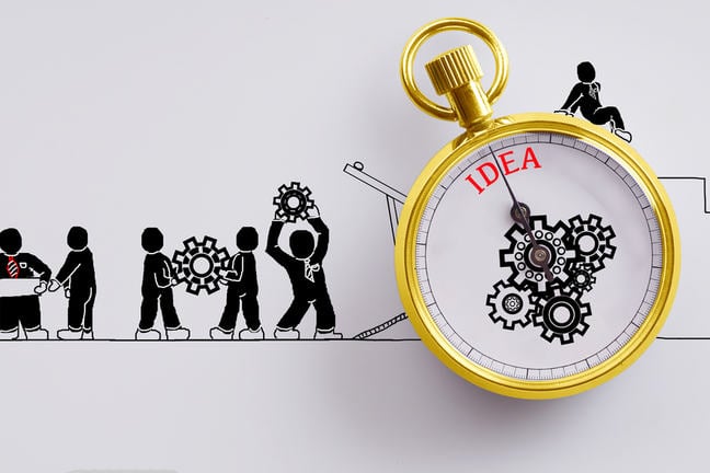 People carrying the workings of a clock towards an idea