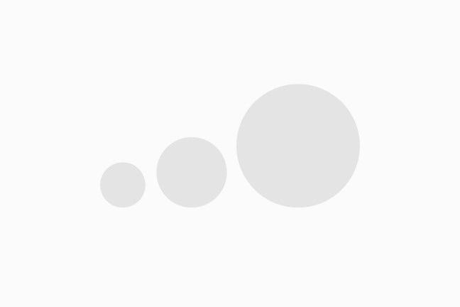 A row of three circles, which gets larger and larger as you go from left to right