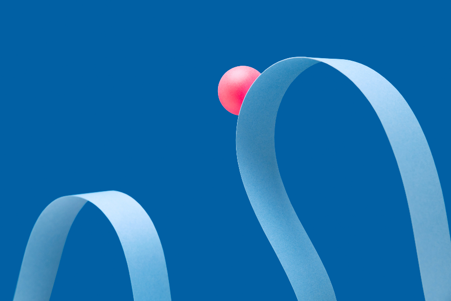 A ping pong ball flowing along a winding ribbon.