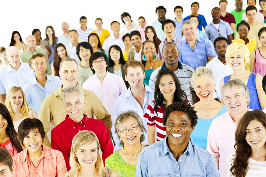 Image show large number of people who are different in age, gender and ethnicity