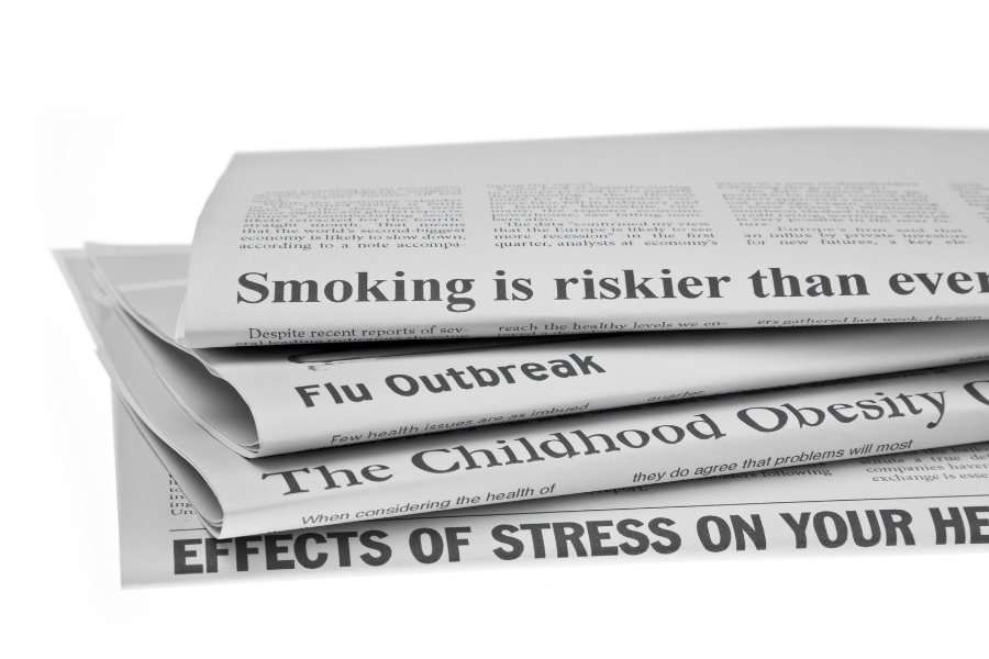 Series of newspaper headlines reporting health stories