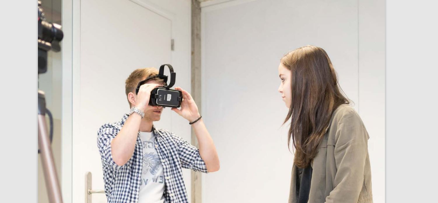 Female and male student using VR-glasses