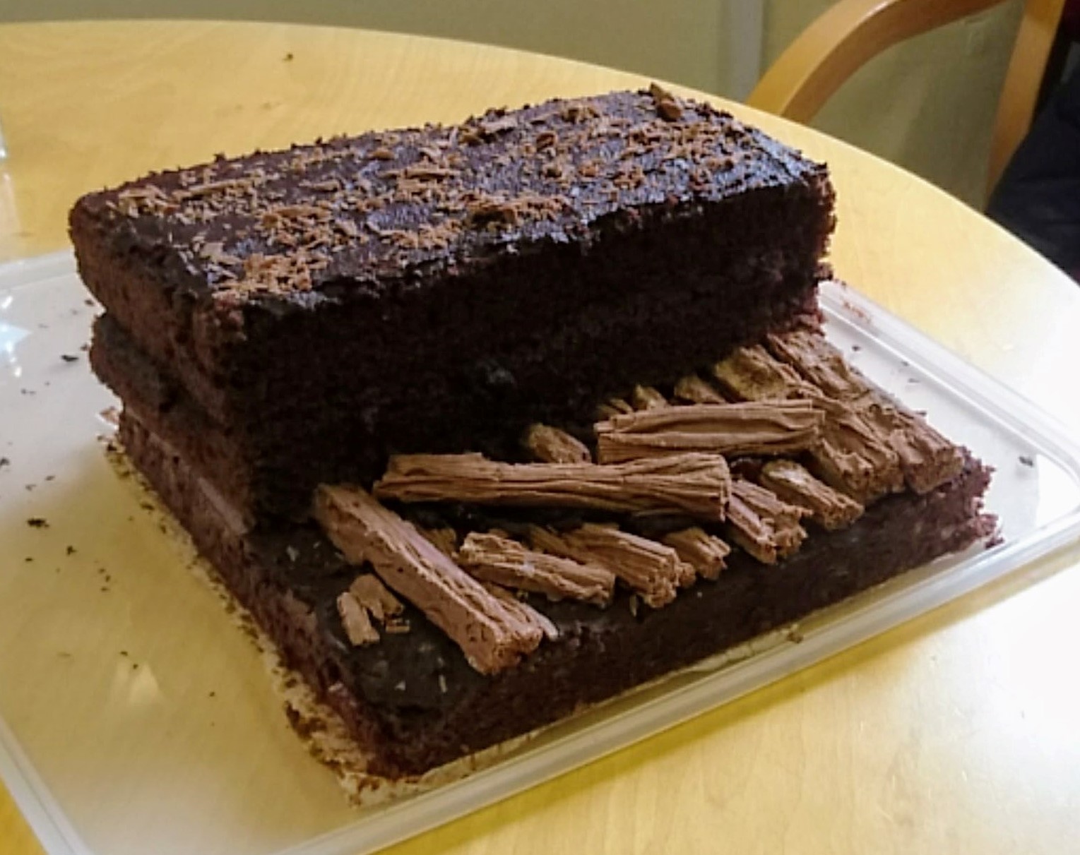 A picture of a cake which has been created to represent the layers of sediment at Star Carr