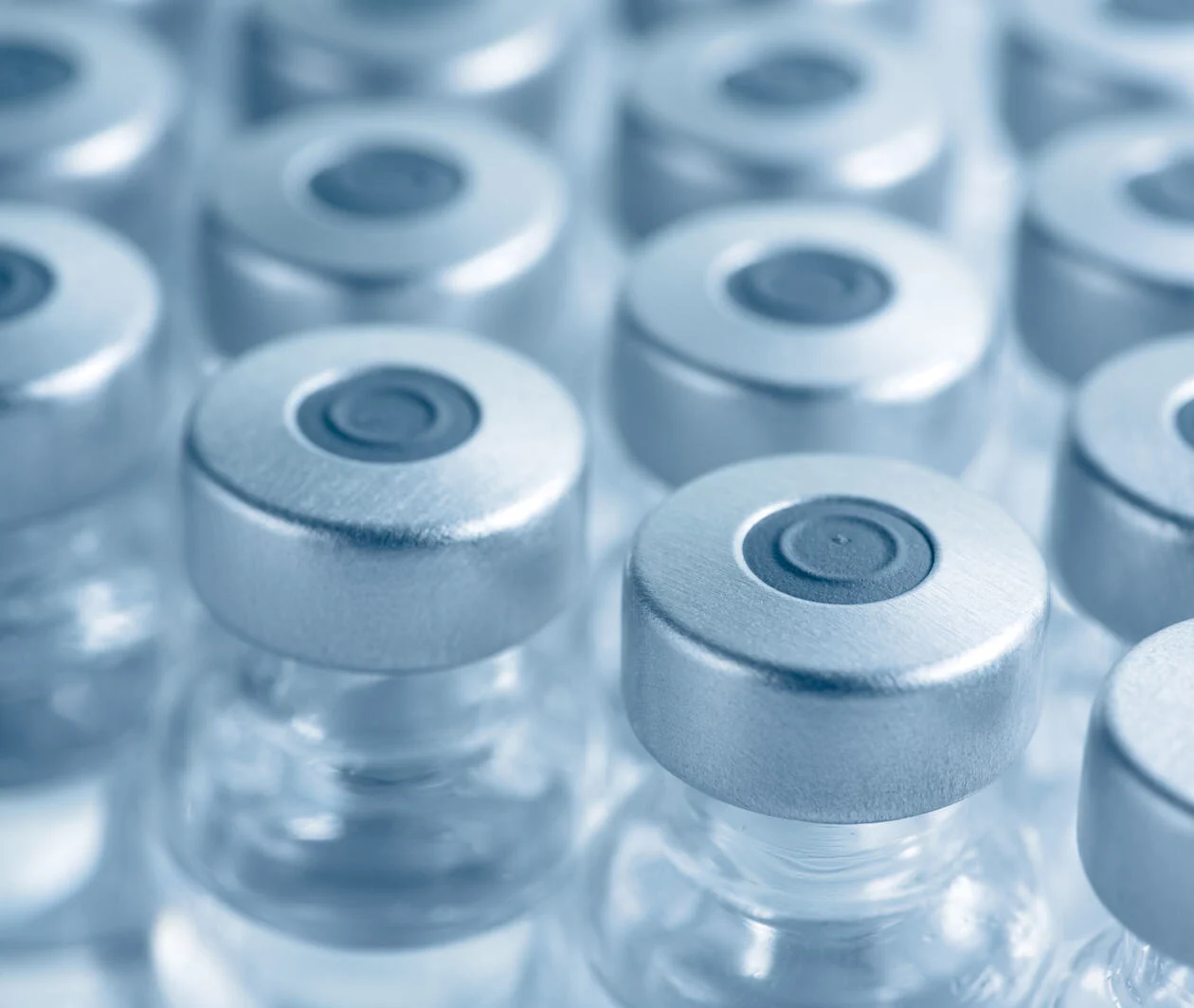 Closeup of vials of vaccine.