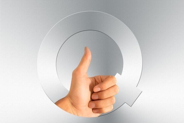 Letter Q with thumbs up