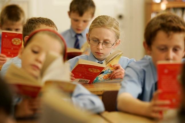 Children reading in a classroom